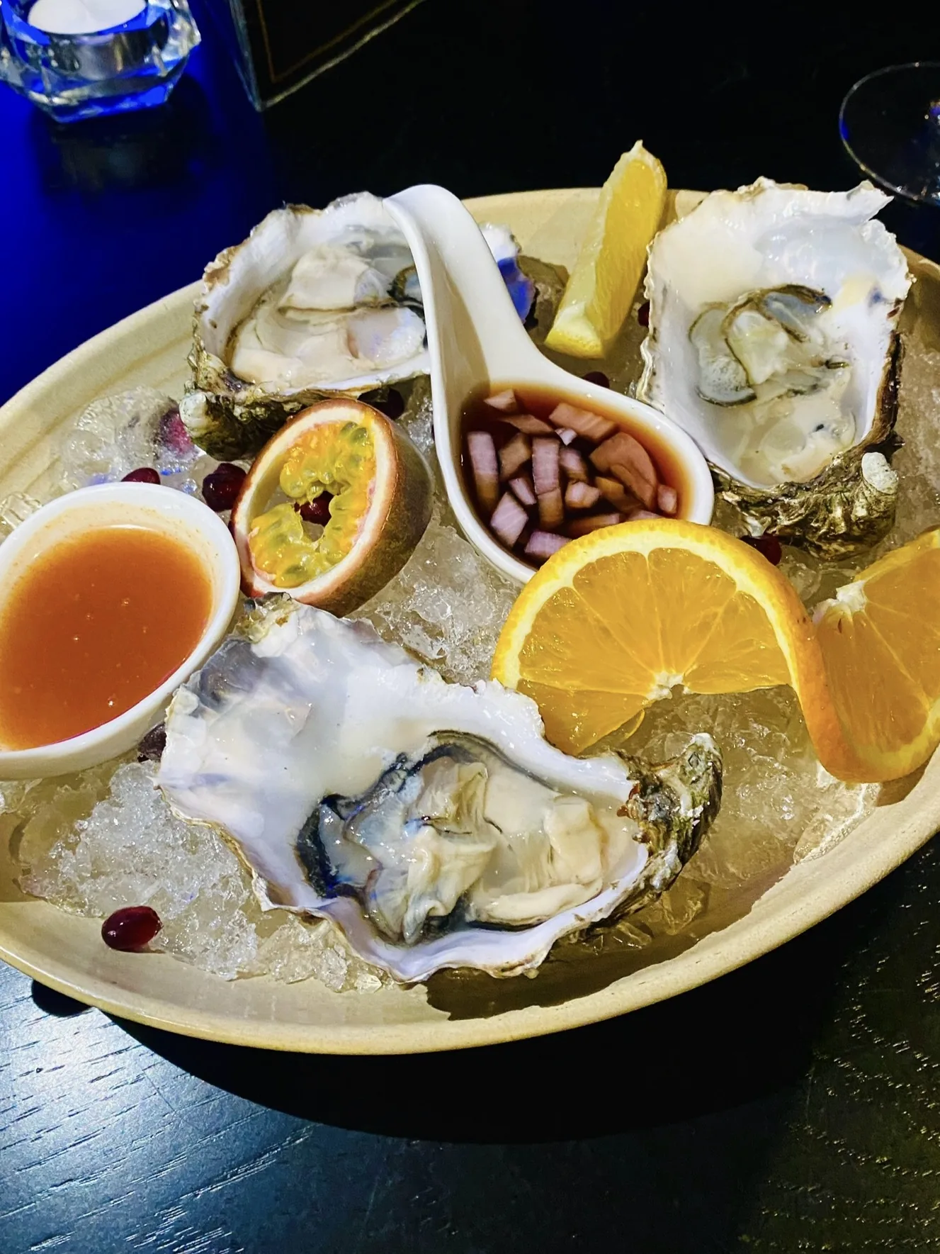 Fresh oysters with lemon at Onyx Restaurant & Bar