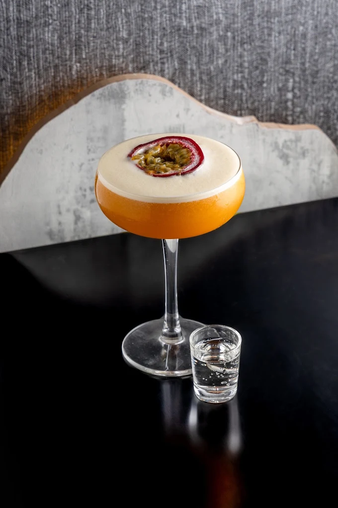Passionfruit martini served with a shot