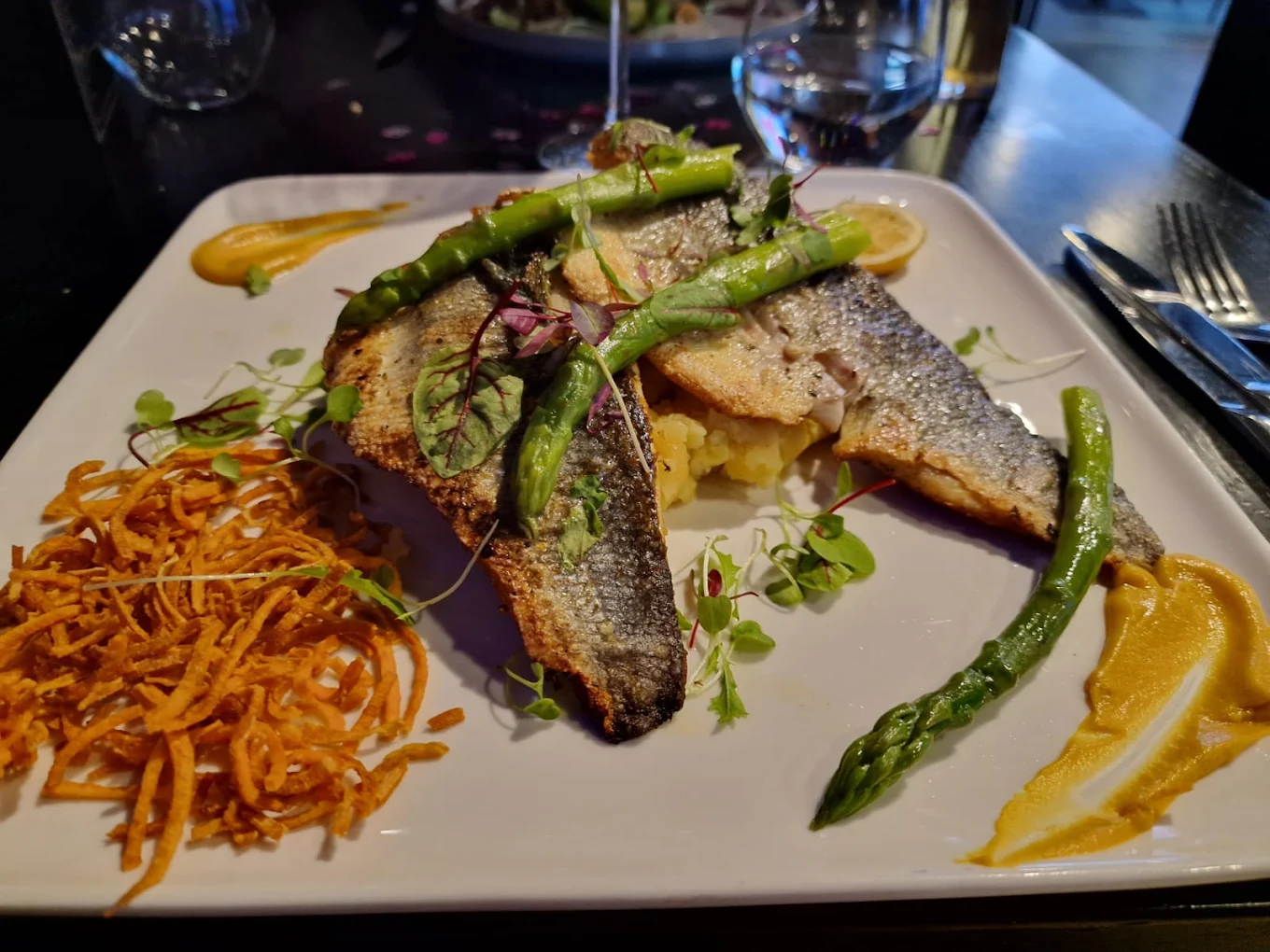 Seabass served with asparagus and vegetables